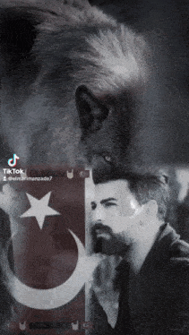 a black and white photo of a man and a wolf with the word bozkurt on the bottom