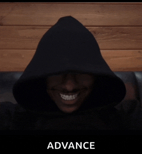 a man wearing a black hoodie is smiling and the word advance is behind him
