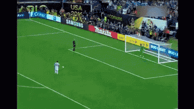 a soccer field with samsung and makita advertisements on the sidelines