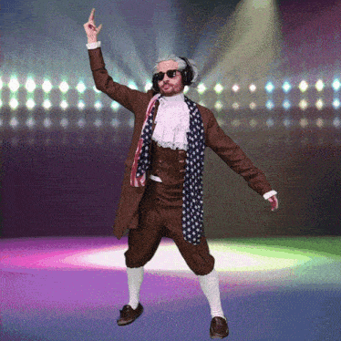 a man dressed as benjamin franklin is dancing in front of a stage