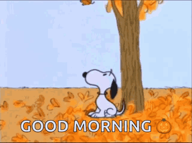 a cartoon of snoopy sitting under a tree with leaves on it and the words `` good morning '' .