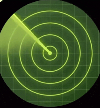 a radar screen shows a green circle with a yellow arrow pointing to it