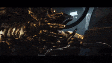 a giant robot with horns is standing in a room