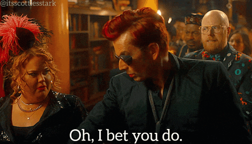 a man with red hair says oh i bet you do in front of a woman