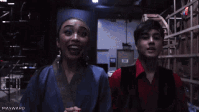 a man and a woman are standing next to each other with maymay entrata written on the bottom