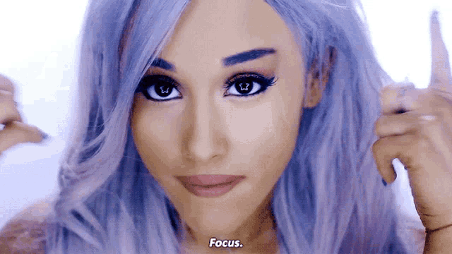 a close up of a woman 's face with the words focus visible