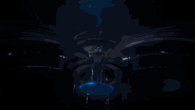 a man is standing in a dark room with a glowing circle around him
