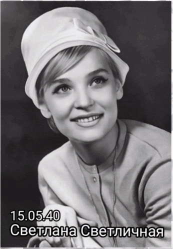 a black and white photo of a smiling woman with the date 15.05.40