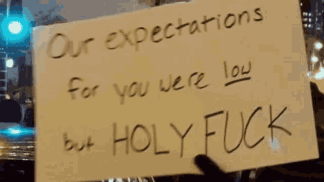 a sign that says " holly fuck " on it