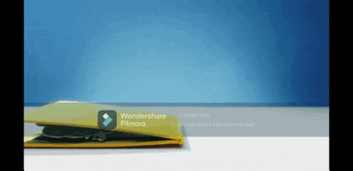 a yellow binder with wondershare filmora on it