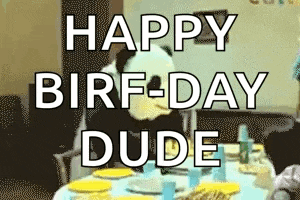 a happy birthday dude greeting is displayed on a table with plates and napkins