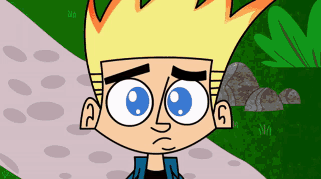 a cartoon character with big blue eyes and the letter g on his face