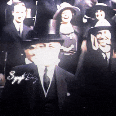 a man in a suit and top hat is surrounded by other people with the words 3yup bey written on the bottom right