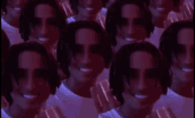 a bunch of men are smiling in a row