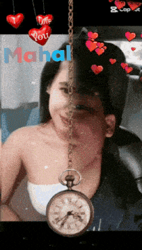 a picture of a woman and a pocket watch with the name mahal on it