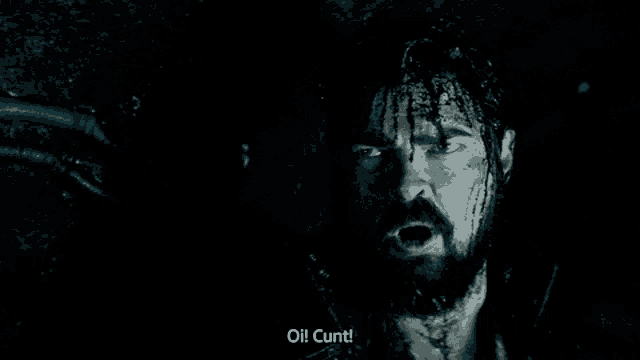 a man with blood coming out of his head says oil cunt