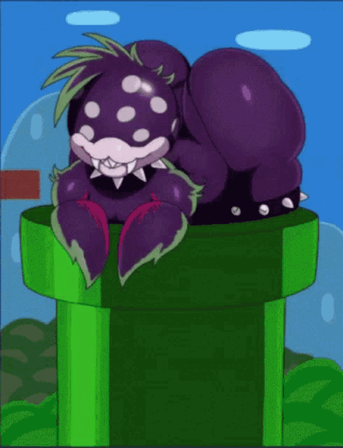 a purple monster is sitting on top of a green pipe .
