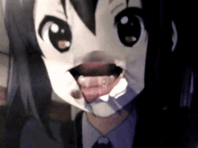 a close up of a person 's face with a mask on