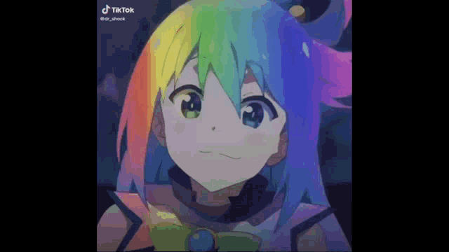 a girl with a rainbow hair and green eyes is smiling