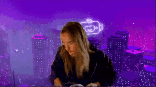 a woman is dancing in front of a purple background with a robot icon