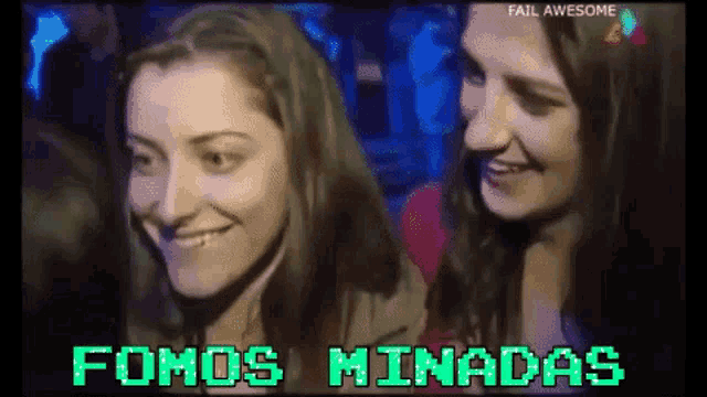 two women are smiling in front of a sign that says fail awesome