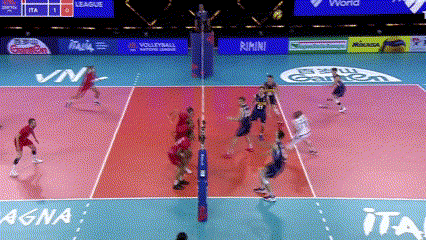 a volleyball game is being played on a court with advertisements for mikasa and rimini