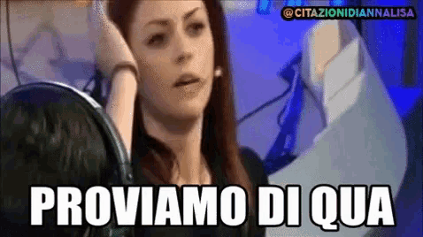 a woman wearing headphones says " proviamo di qua " in white letters