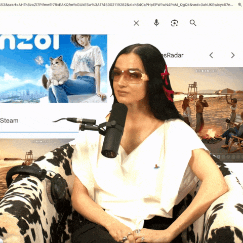 a woman wearing sunglasses sits in front of a microphone and a screen that says " steam "