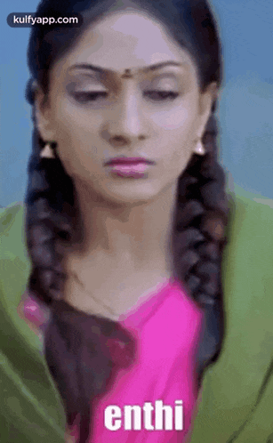 a close up of a woman 's face with the word enthi written on it