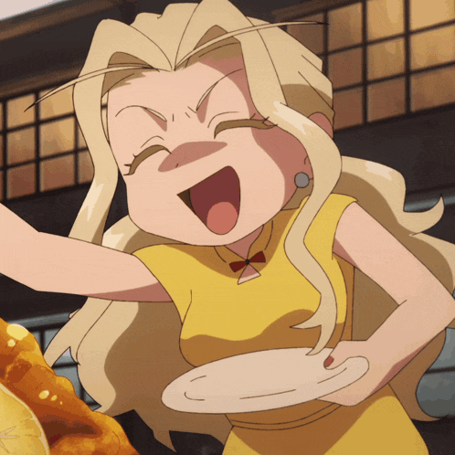 a woman in a yellow dress is holding a plate and smiling