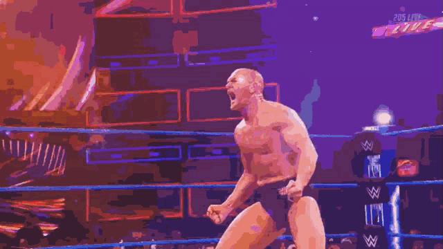 a man in a boxing ring with 205 live written on the bottom right