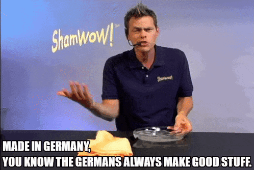 a man in a blue shirt with shamwow on it