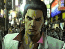 a man in a white suit is standing in a crowded city street .