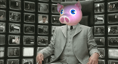a man in a suit with a pink pig head