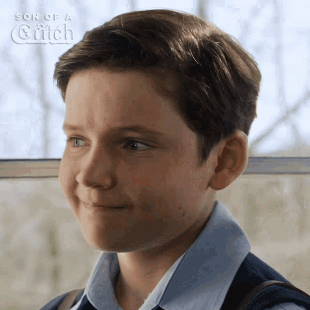 a boy is smiling in a son of a catch ad