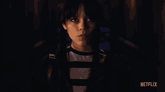 a woman 's hand is reaching out in a netflix advertisement