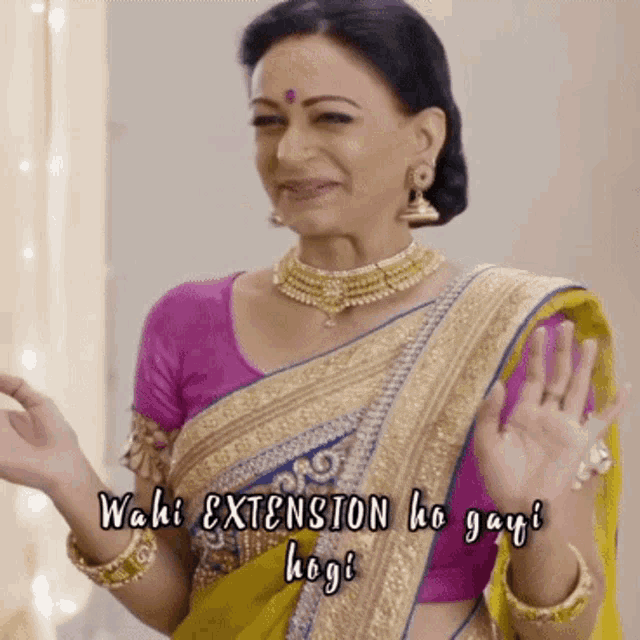 a woman in a yellow and blue saree with a caption that says wahi extension ho gayi hogi