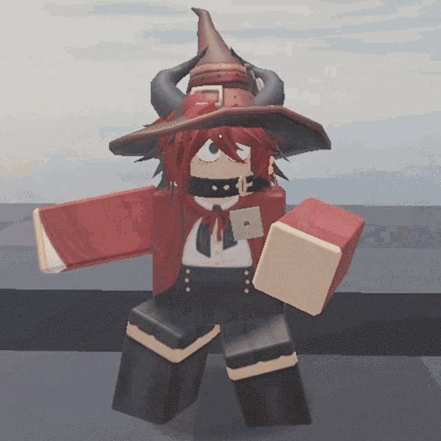 a cartoon character wearing a witch hat with horns