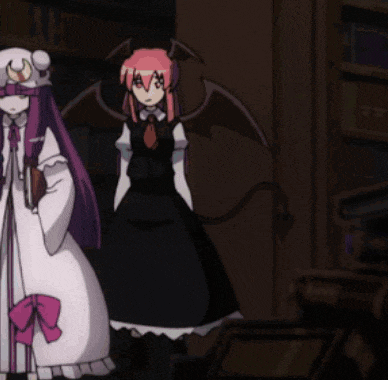 two anime characters standing next to each other with one wearing a devil costume