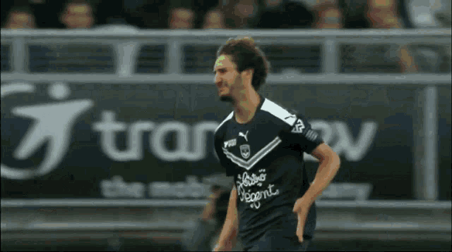 a soccer player wearing a jersey that says transv
