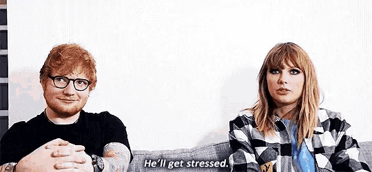 ed sheeran and taylor swift are sitting next to each other on a couch and talking to each other .