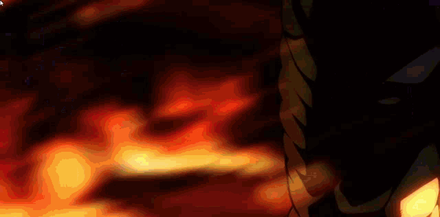 a close up of a cartoon character with a fire background .