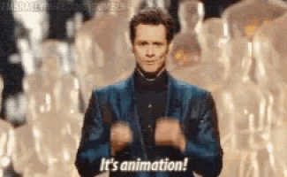 a man in a blue suit is standing in front of a crowd of people and says it 's animation .