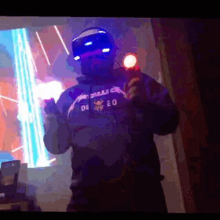 a man wearing a virtual reality headset and a metallica shirt