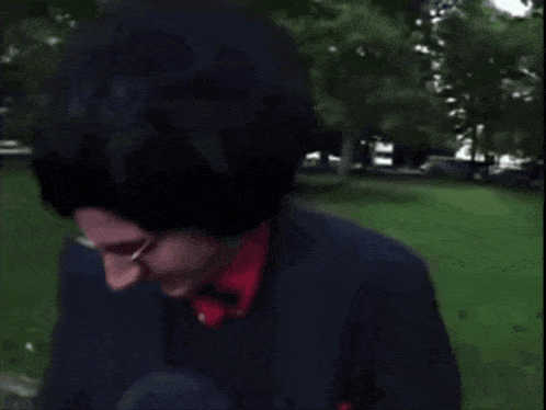 a man wearing a bunny costume says " dit bonjour noopy " while holding a microphone