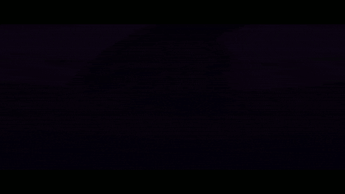 a purple minecraft character is standing in a green tunnel .