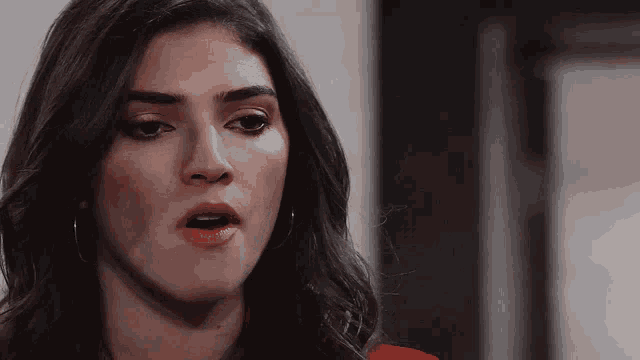 a woman with a surprised look on her face