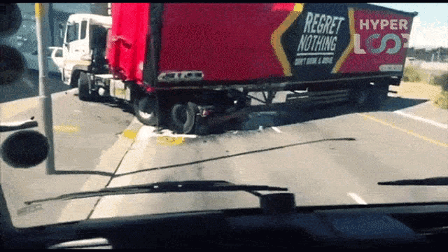 a truck with regret nothing written on the side of it