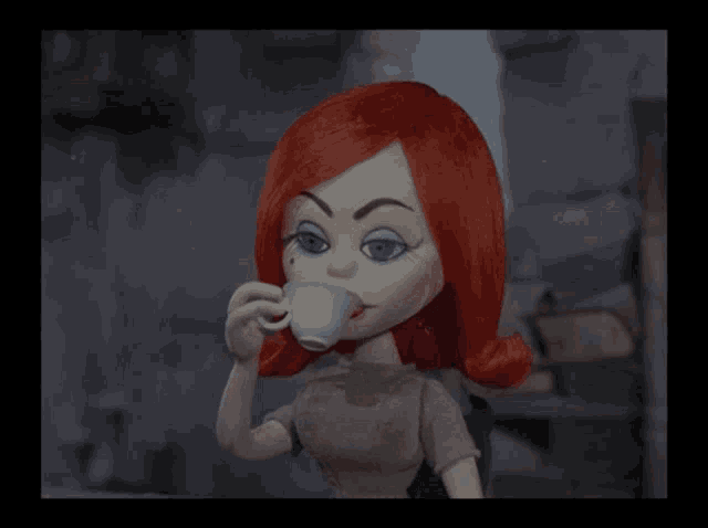 a cartoon doll with red hair is drinking from a cup