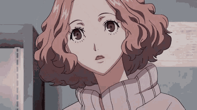 a close up of a girl with curly hair and a pink sweater